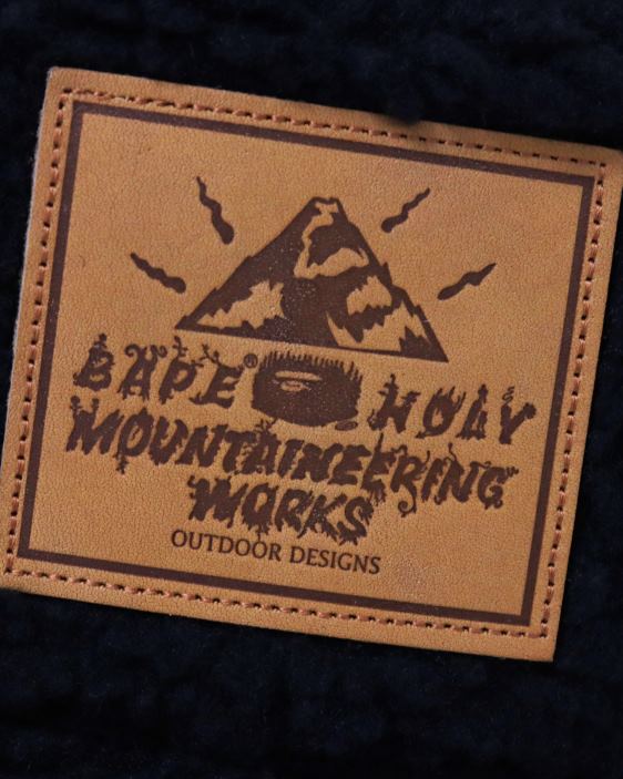 sombrero de pescador reversible 1st camo boa mujer negro 26D801155 A Bathing Ape